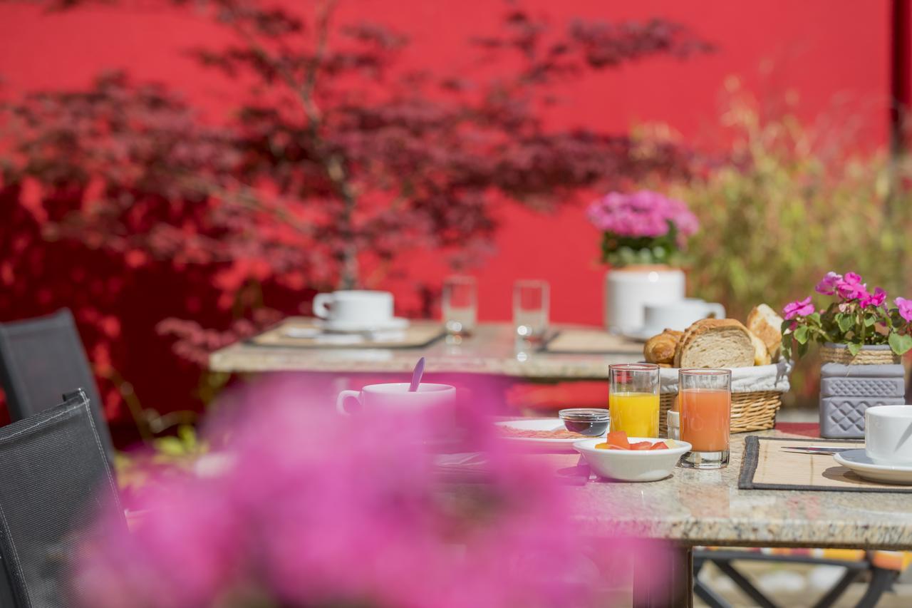 Le Flamboyant Hotel Анси Екстериор снимка
